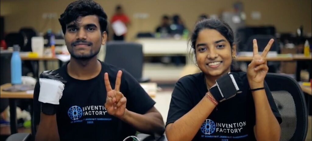 Aditya and Nivedita wearing the prototype they invented